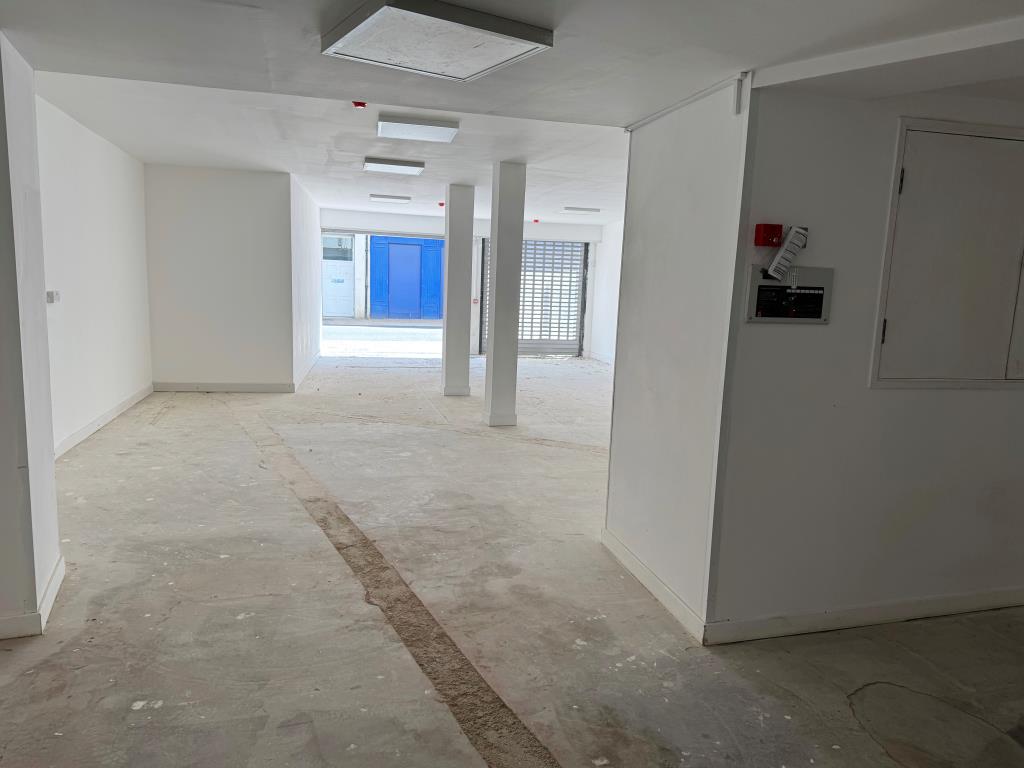 Lot: 122 - TOWN CENTRE LOCK-UP SHOP FOR INVESTMENT OR OWNER OCCUPATION - A View Forward from the very Rear of the shop